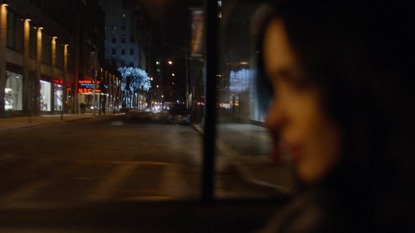 View of NBC Marquee from taxi at night.