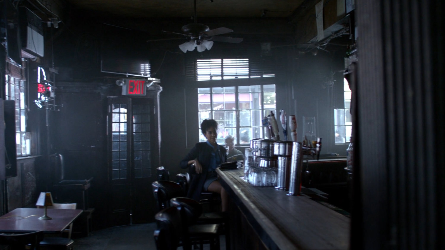 Gina in Luke Cage's bar.