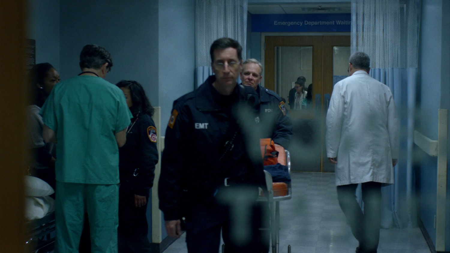Staff and patients in the Metro General Emergency Room.