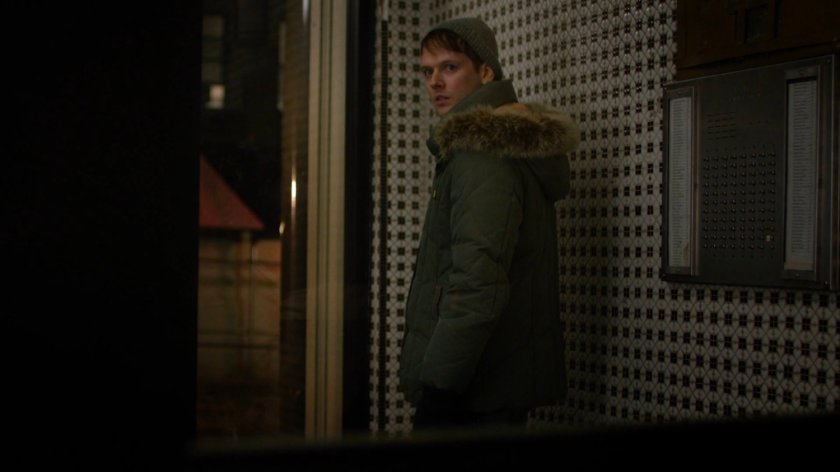 Ruben in front lobby of Alias Investigations building.