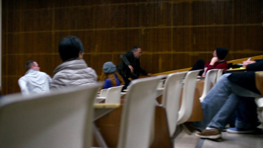 David Kurata running through a classroom.