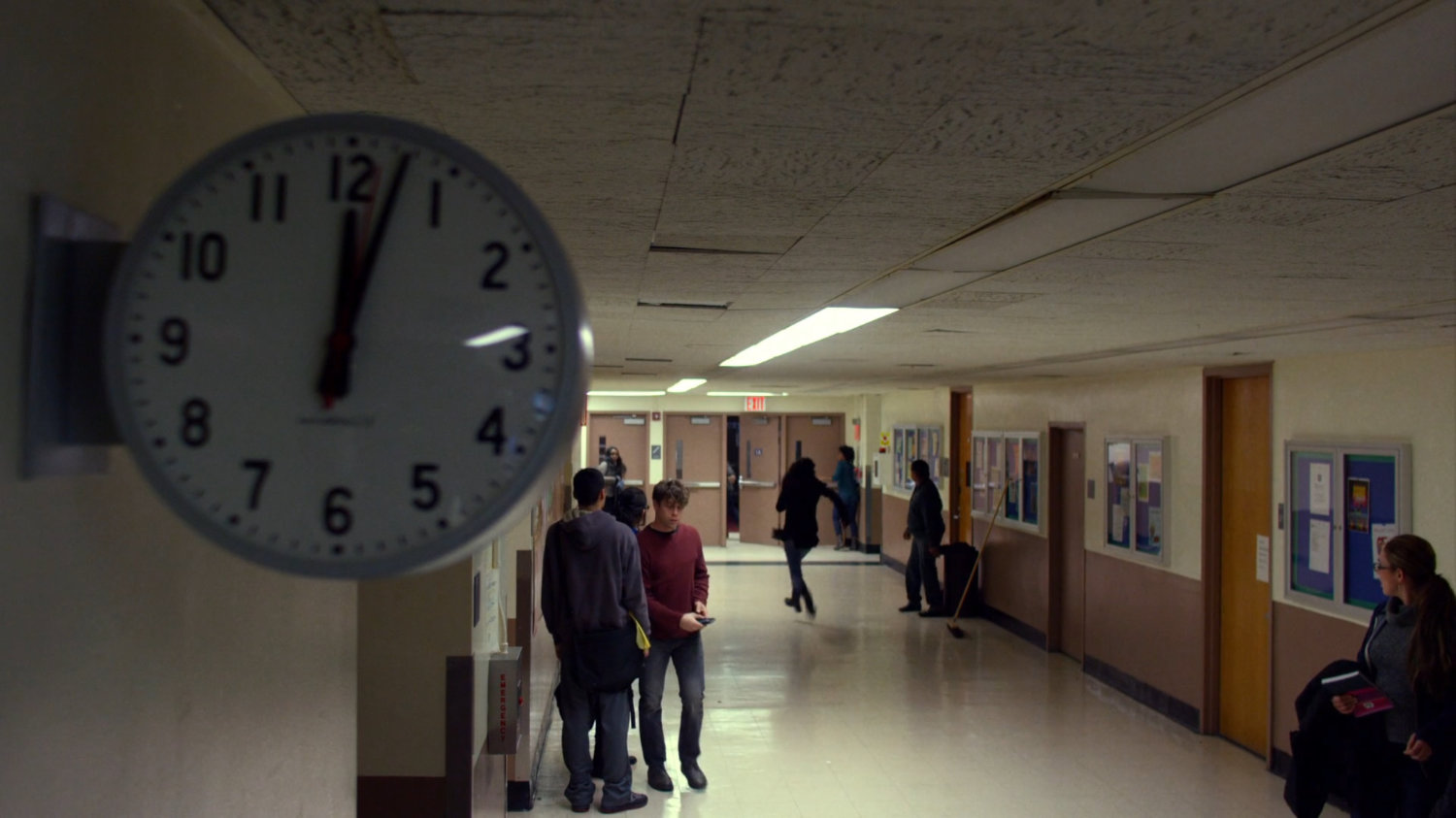 Jessica chasing David Kurata through a school hallway.