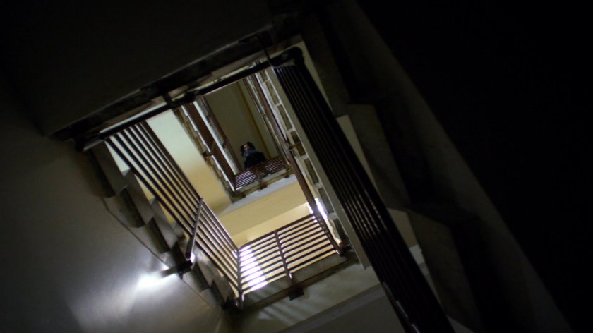 Jessica in a school stairway.