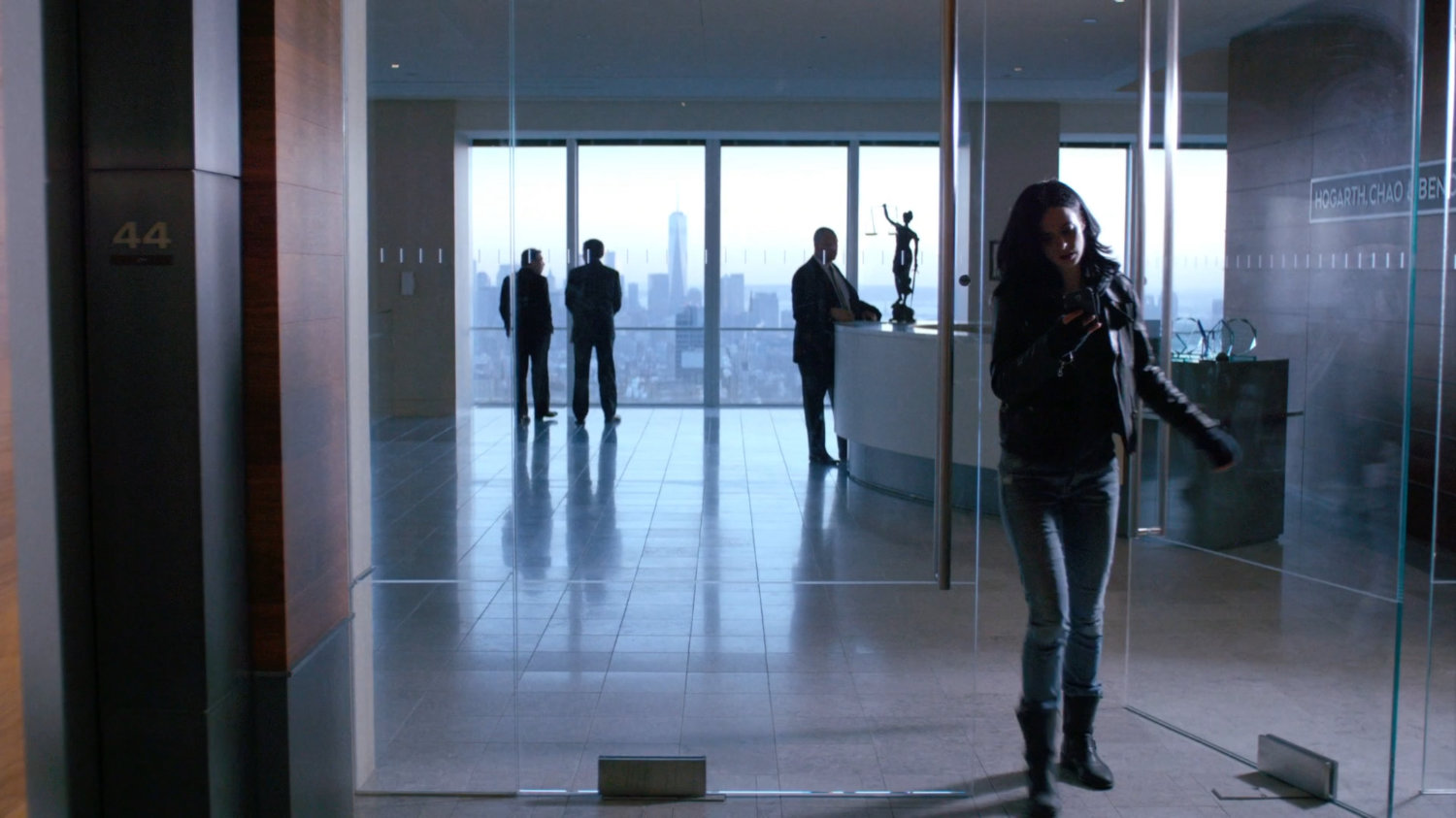 Jessica leaving the lobby of Hogarth, Chao, & Benowitz.