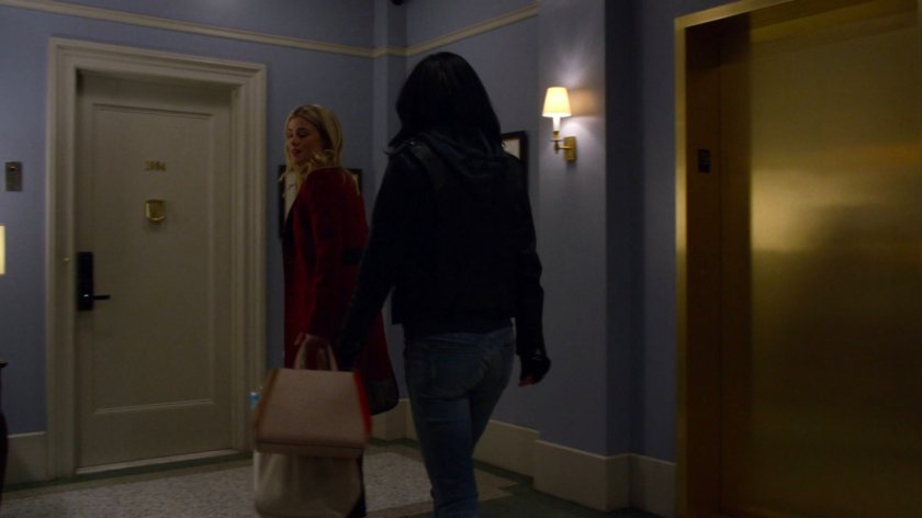 Jessica and Trish in hallway outside Trish's apartment.