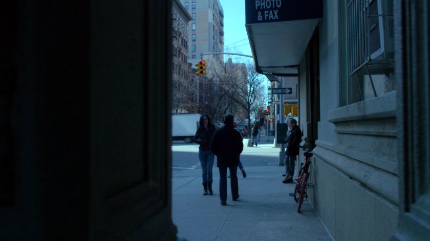 Jessica on sidewalk outside Alias Investigations building.
