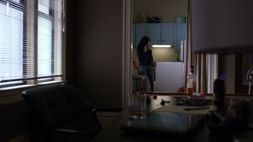 Jessica in her apartment kitchen.