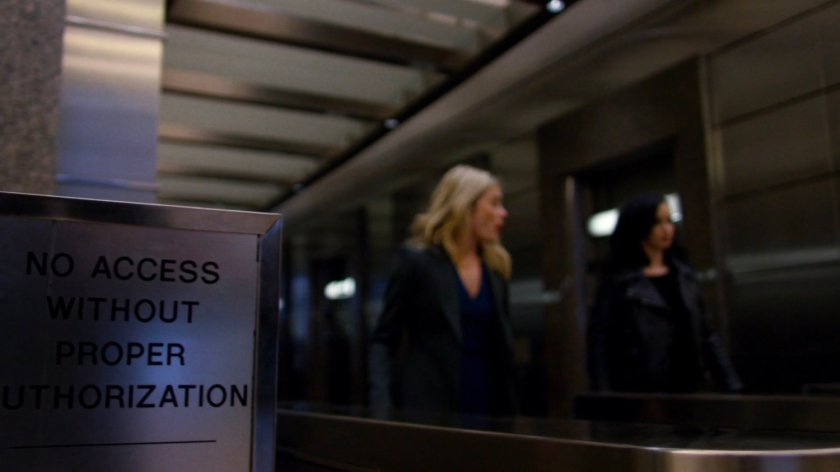 Trish and Jessica walking through WNEX lobby.