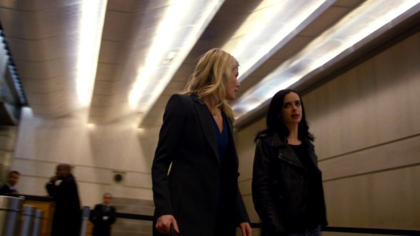 Trish and Jessica walking through WNEX lobby.
