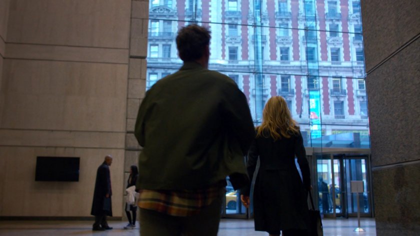 Trish and Jessica walking through WNEX lobby.