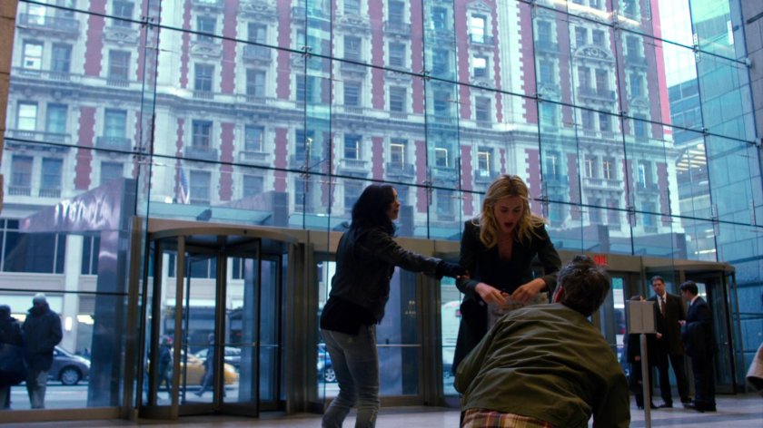 Trish and Jessica walking through WNEX lobby.