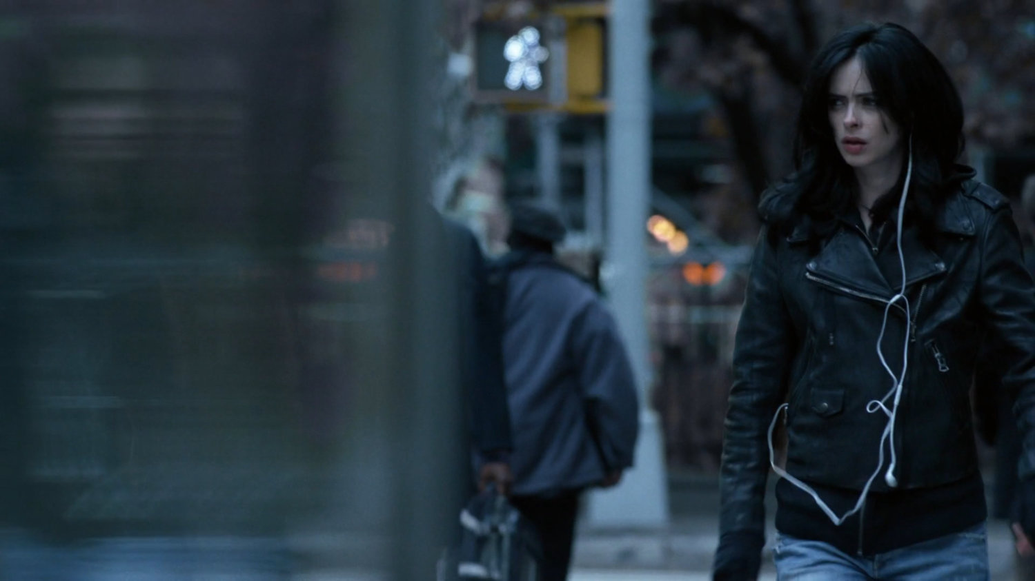 Jessica walking along a Tribeca sidewalk.