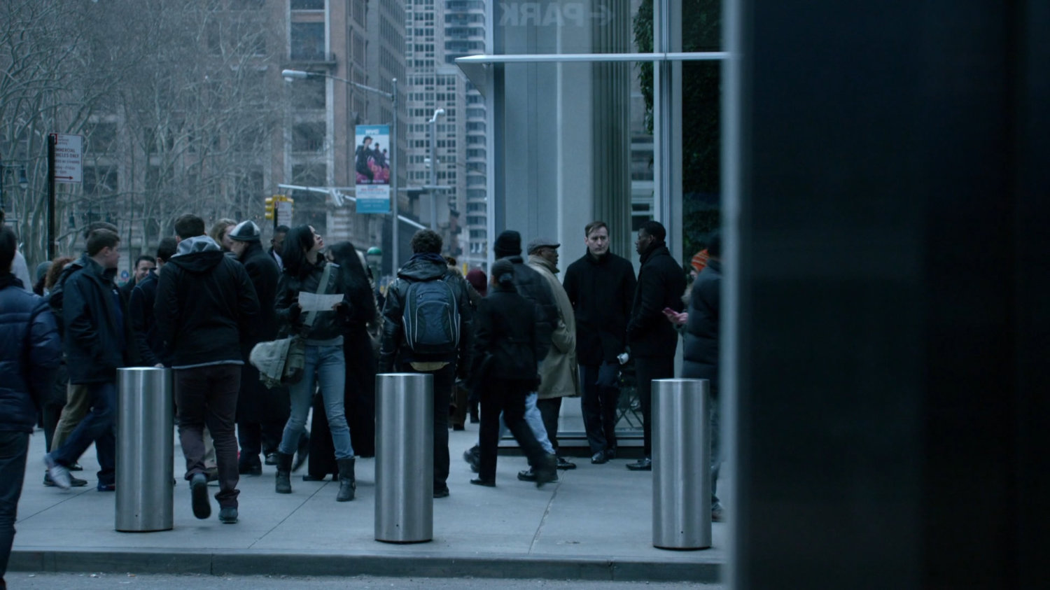 Jessica on sidewalk outside Bank of America tower.