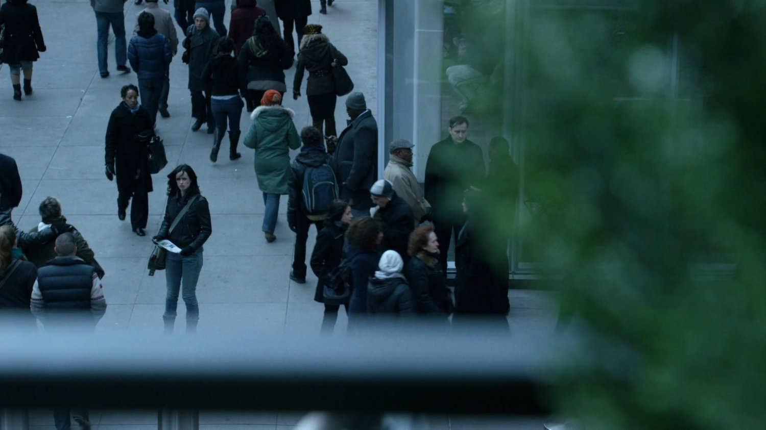 Jessica on sidewalk outside Bank of America tower.