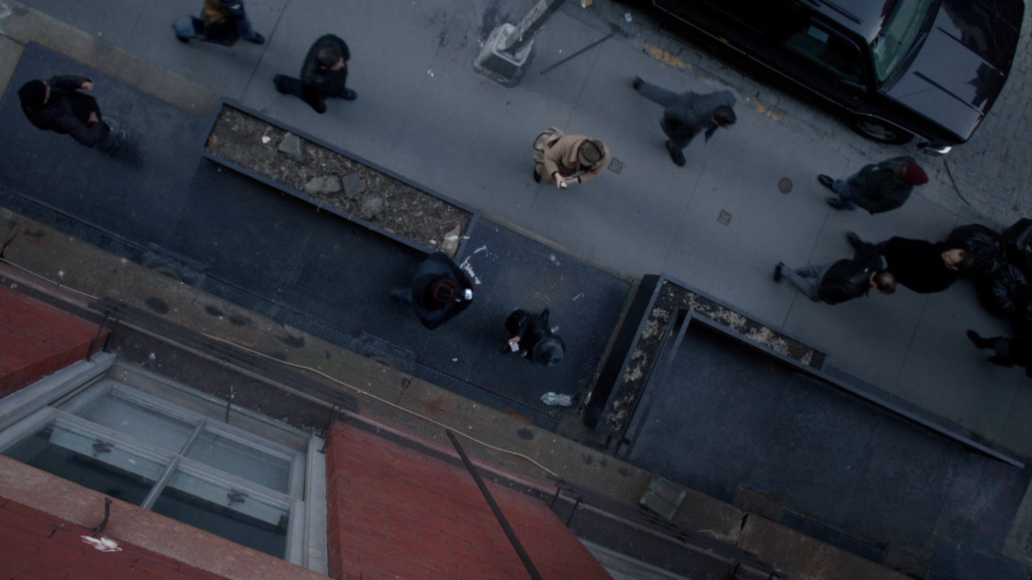 High angle view of sidewalk outside Audrey Eastman's office.