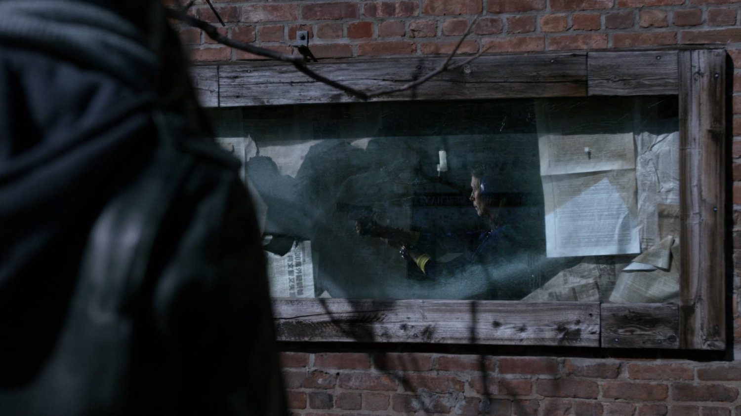 Jessica observing Audrey Eastman inside abandoned bar.
