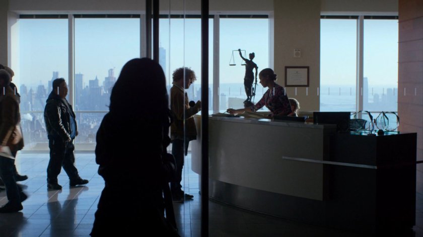 Jessica entering the lobby of Hogarth, Chao, & Benowitz.