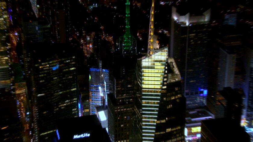 Nighttime aerial above Bank Of America tower.