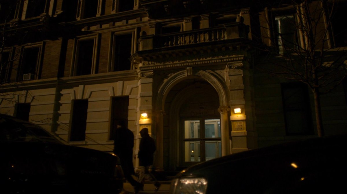 Exterior of building entered by Carlo Eastman.