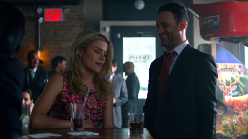 Trish and suited man inside Tyron Public House bar.