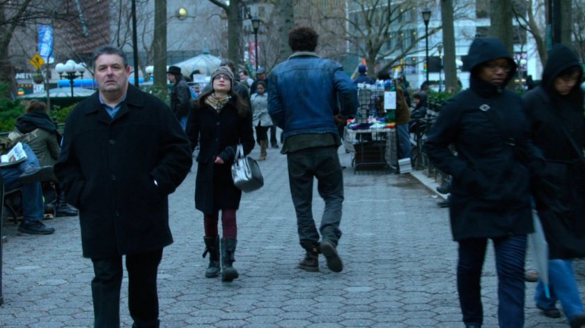 Malcolm walking through Union Square Park.