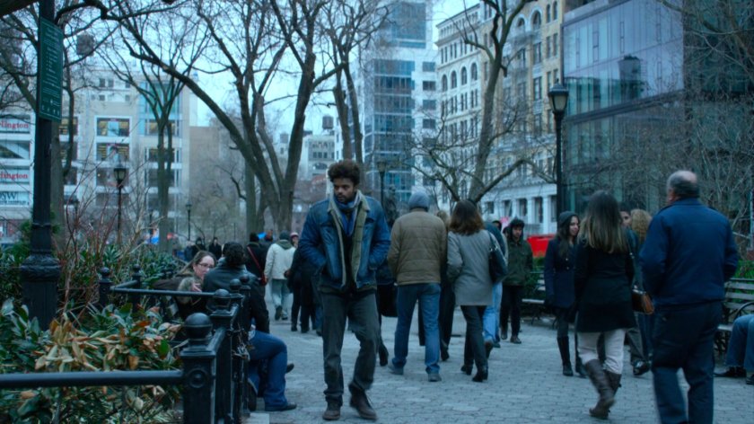 Malcolm walking through Union Square Park.