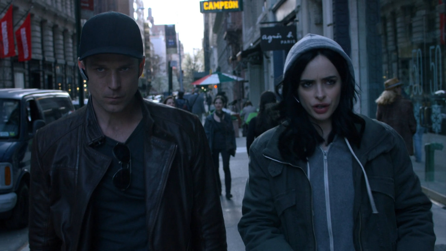 Jessica and Will walking away from van on sidewalk.
