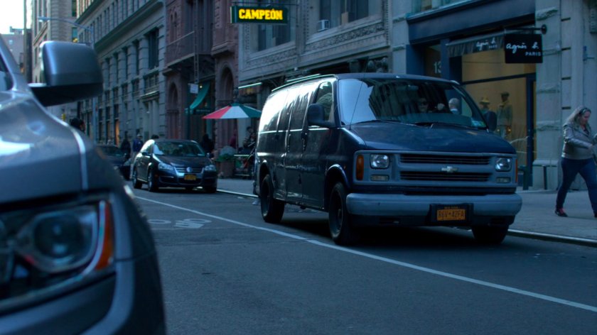 Van parked on side street.