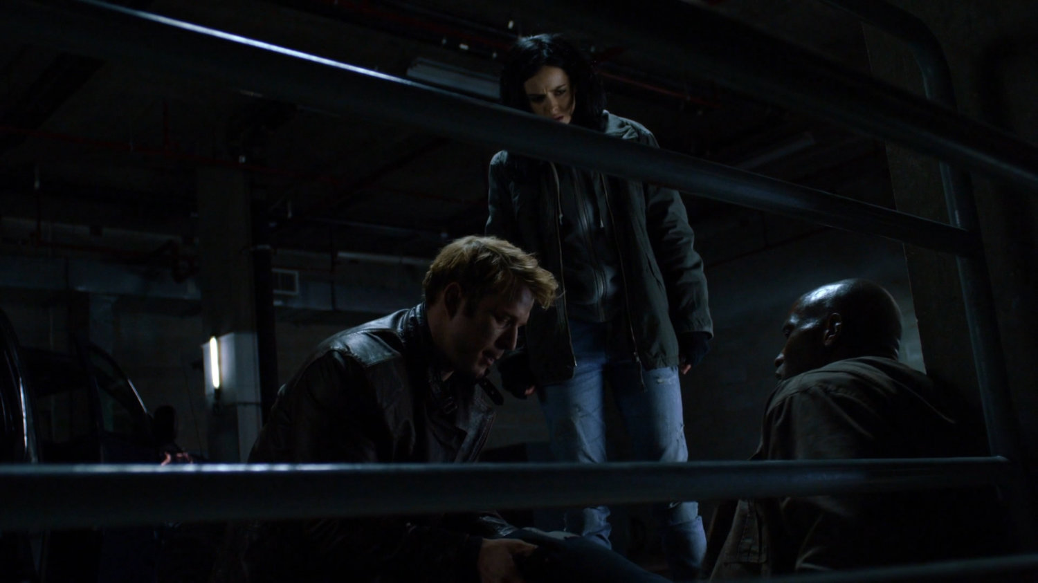 Jessica and Will question a bodyguard at a decommissioned CDC facility.