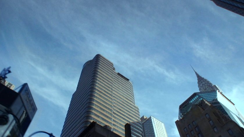 Low angle shot of buildings passing by.