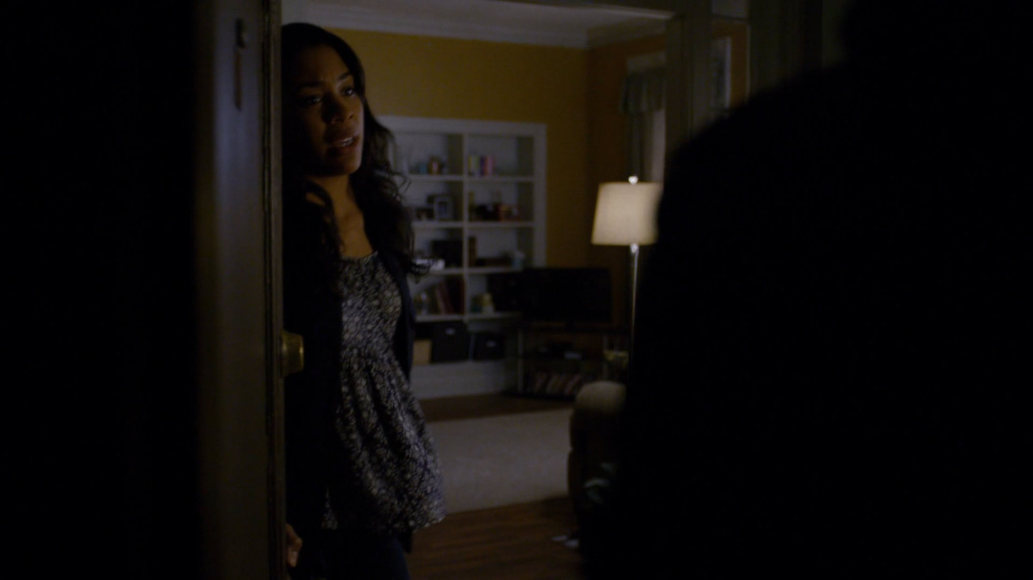 Serena Grier answering her apartment door.
