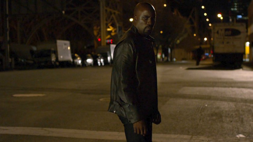 Luke standing on street at night.