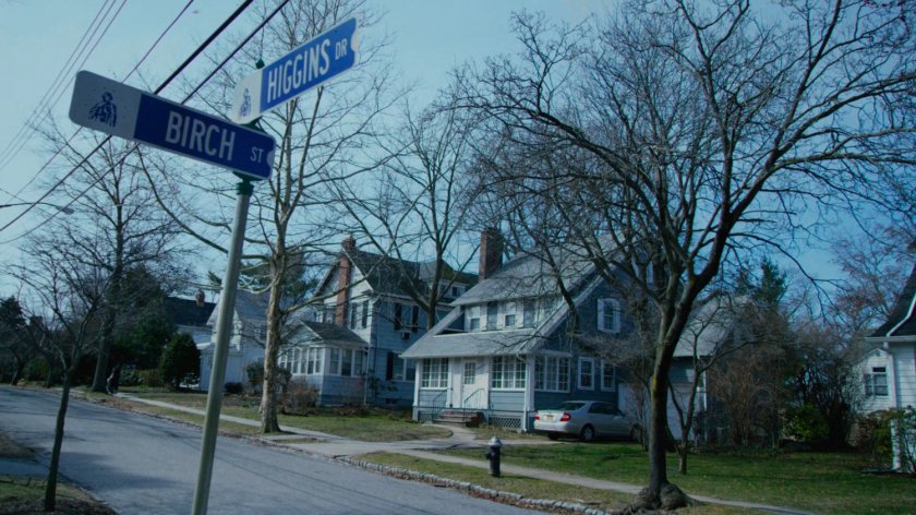 Jessica's childhood home near street sign for Birch Street and Higgins Drive.