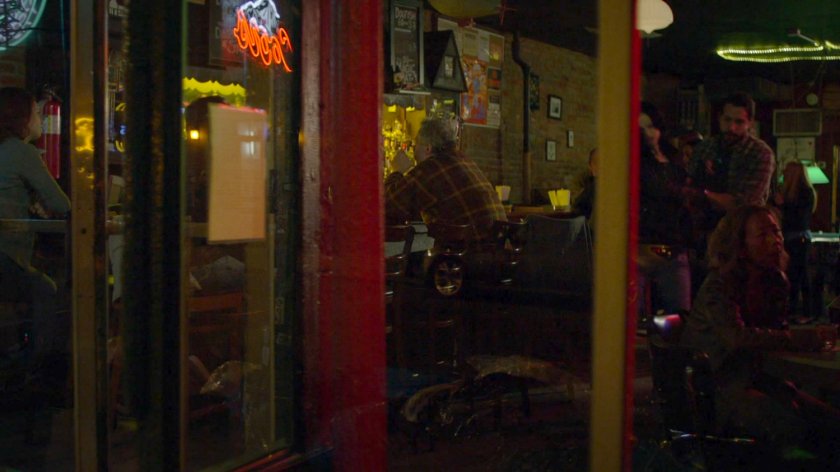 Jessica being "escorted" out of a bar.