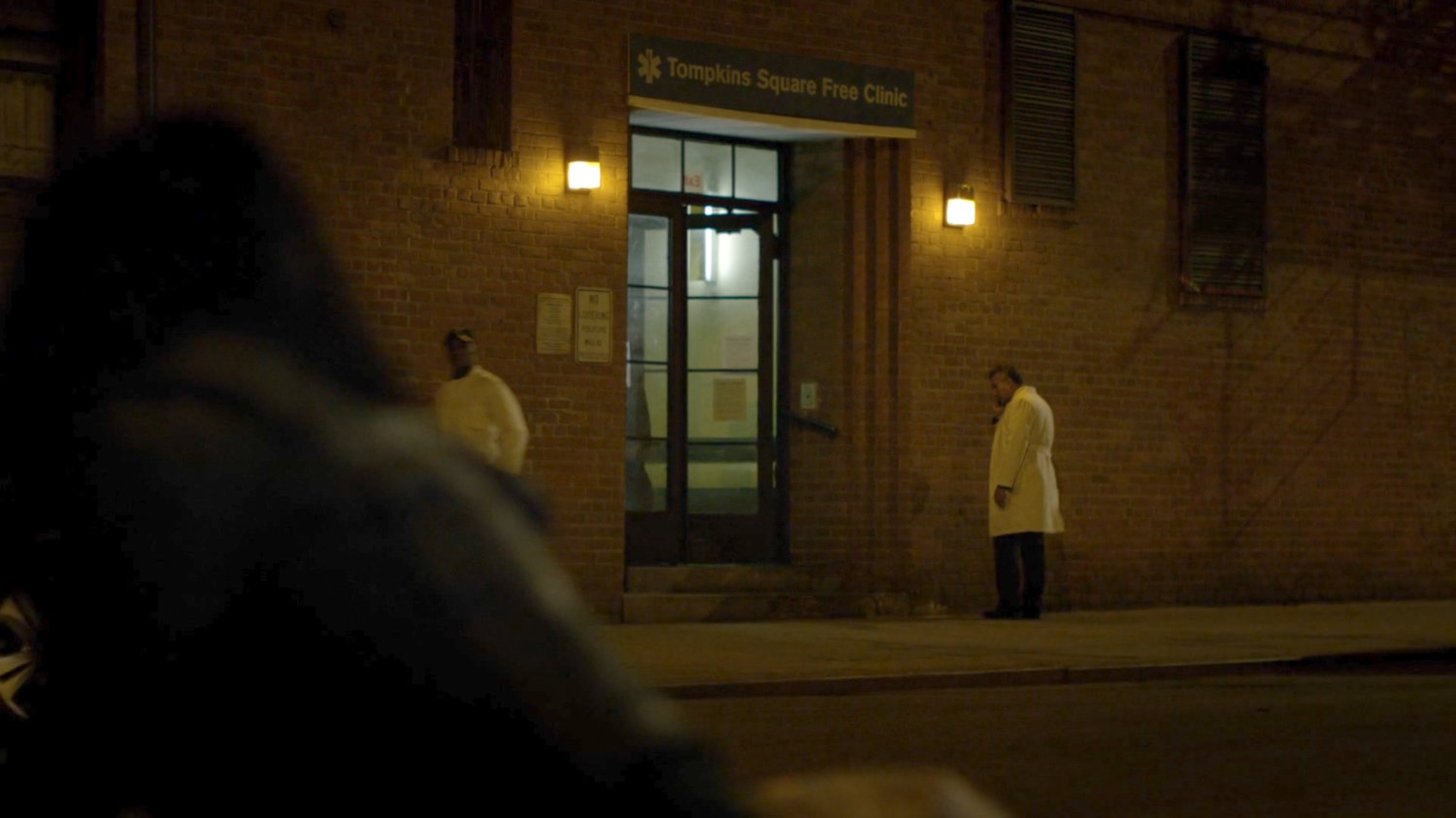 Nighttime exterior of Tompkins Square Free Clinic.