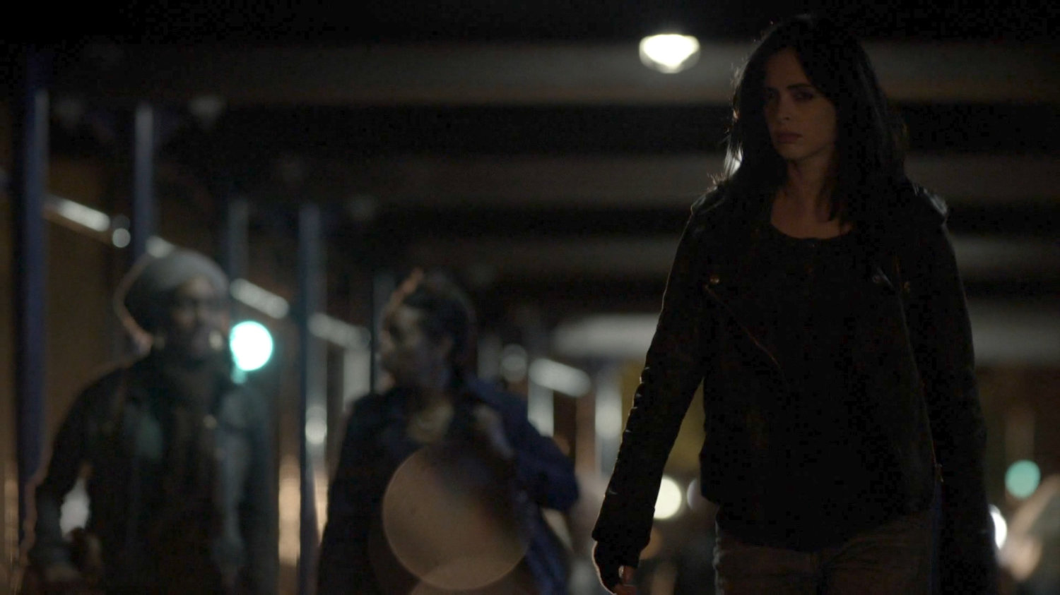 Jessica following Wendy along sidewalk at night.