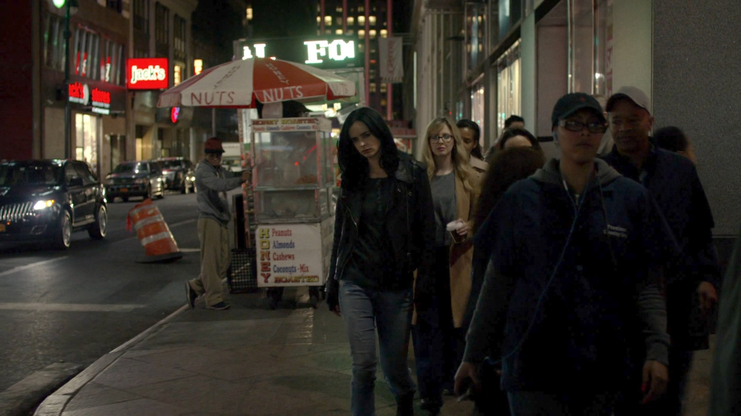 Jessica following Wendy along sidewalk at night.