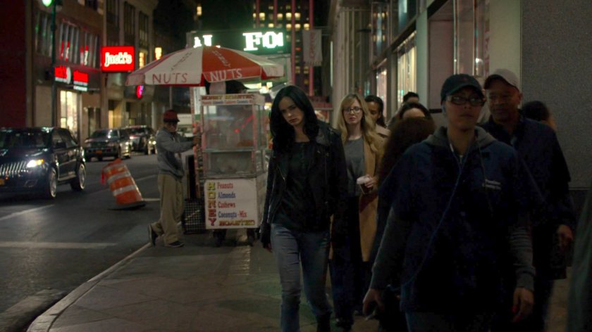 Jessica following Wendy along sidewalk at night.