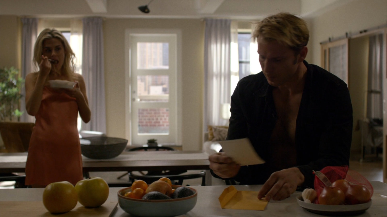 Trish and Will in her apartment.