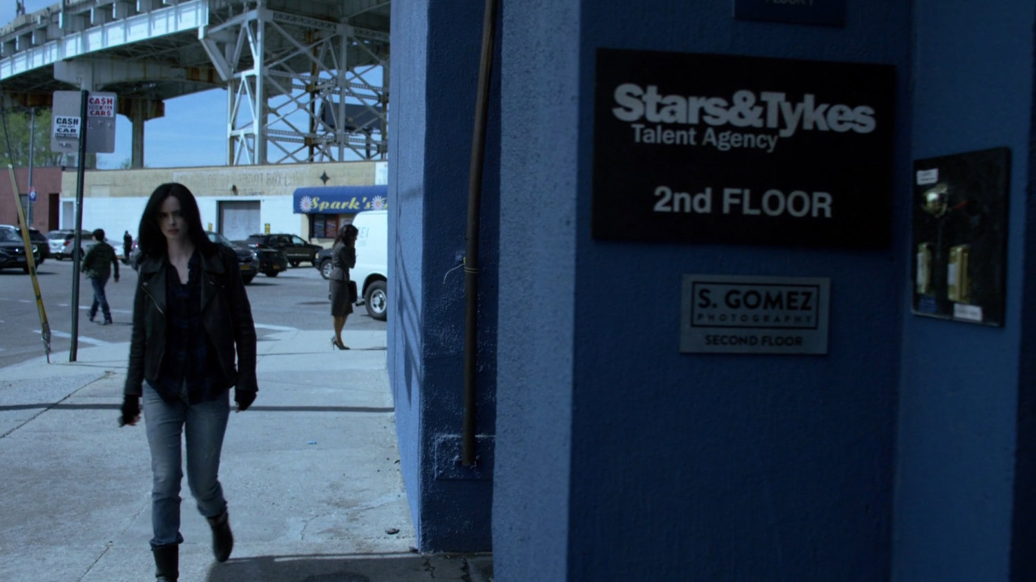 Jessica approaching entrance to Stars & Tykes Talent Agency.