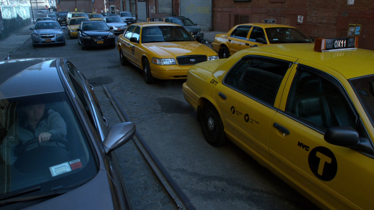 Traffic jam of cars and taxis.