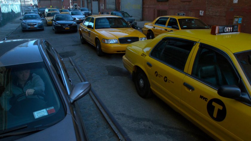 Traffic jam of cars and taxis.