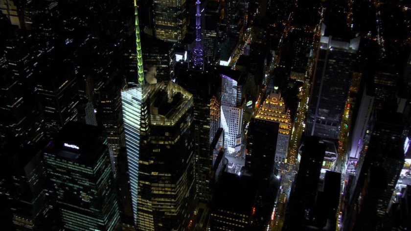 Nighttime aerial above Bank Of America tower.