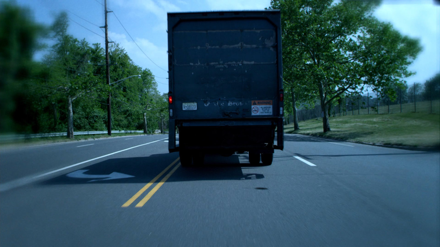 POV from the Jones car behind a truck.