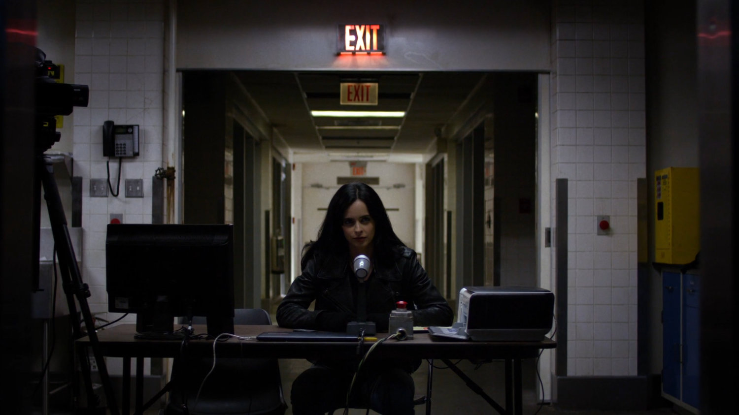 Jessica at a table inside the CDC Facility.