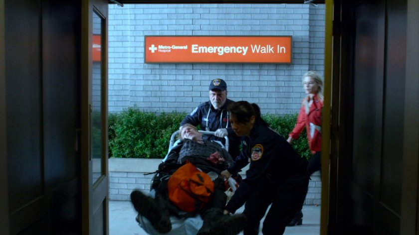 Paramedics rush Will on a gurney into Metro-General Emergency entrance.