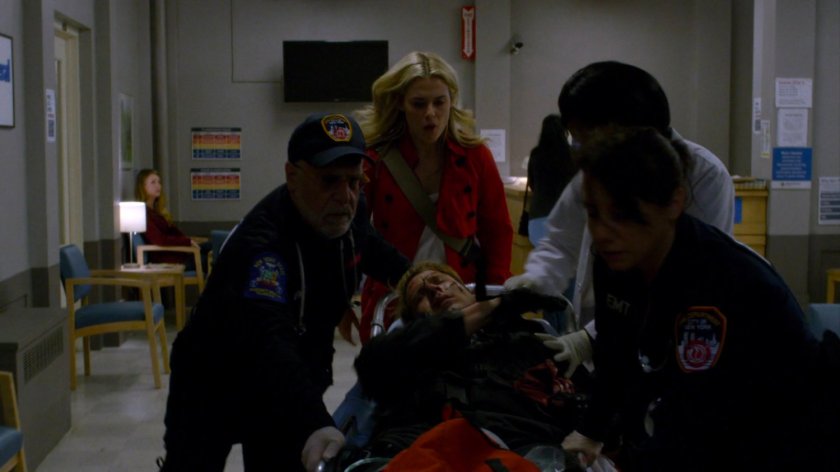 Trish Paramedics rush Will on a gurney into Metro-General Emergency entrance.