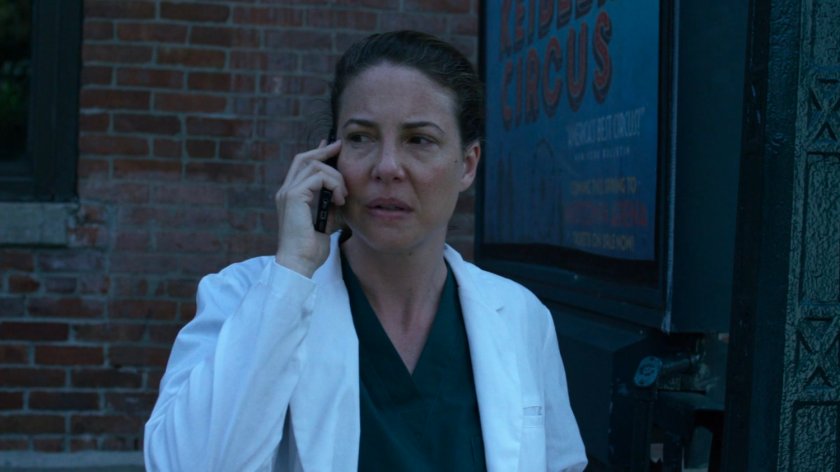 Wendy on a cell phone outside 2 Avenue Subway entrance.