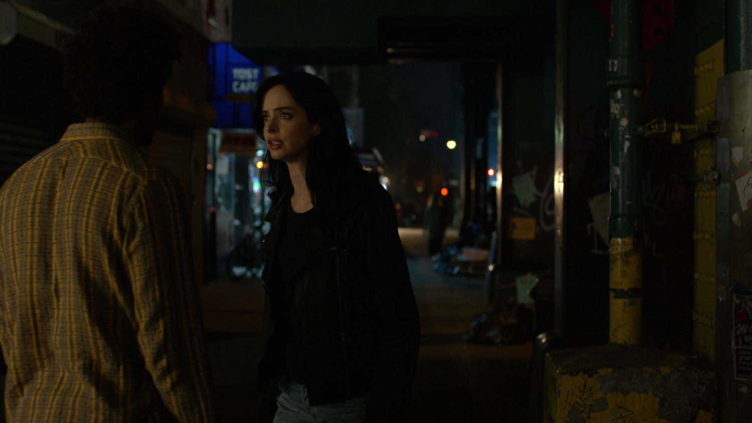 Jessica and Malcolm outside Court Square Diner at night.