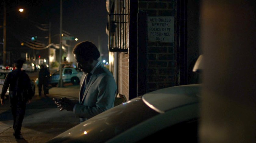 Detective Clemons outside 15th Precinct.